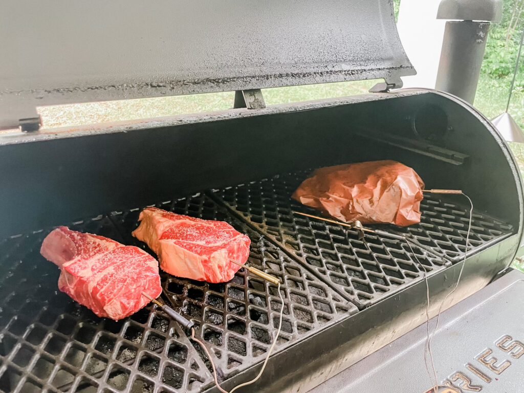 How to reverse sear a steak in a smoker. Two ribeye steaks getting reverse seared in the smoker while a brisket is smoked.